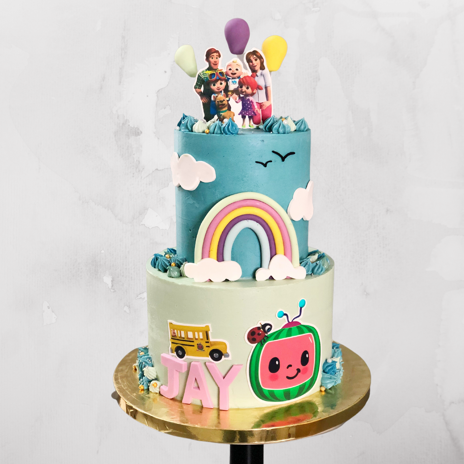 Cocomelon Rainbow School Bus Cake